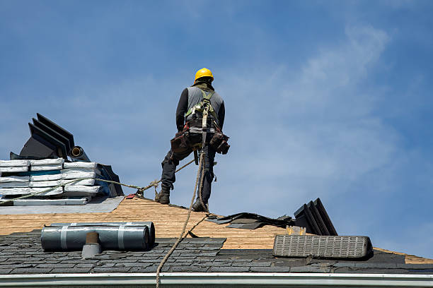 Professional Gutter Installation technician working in Hartland, WI